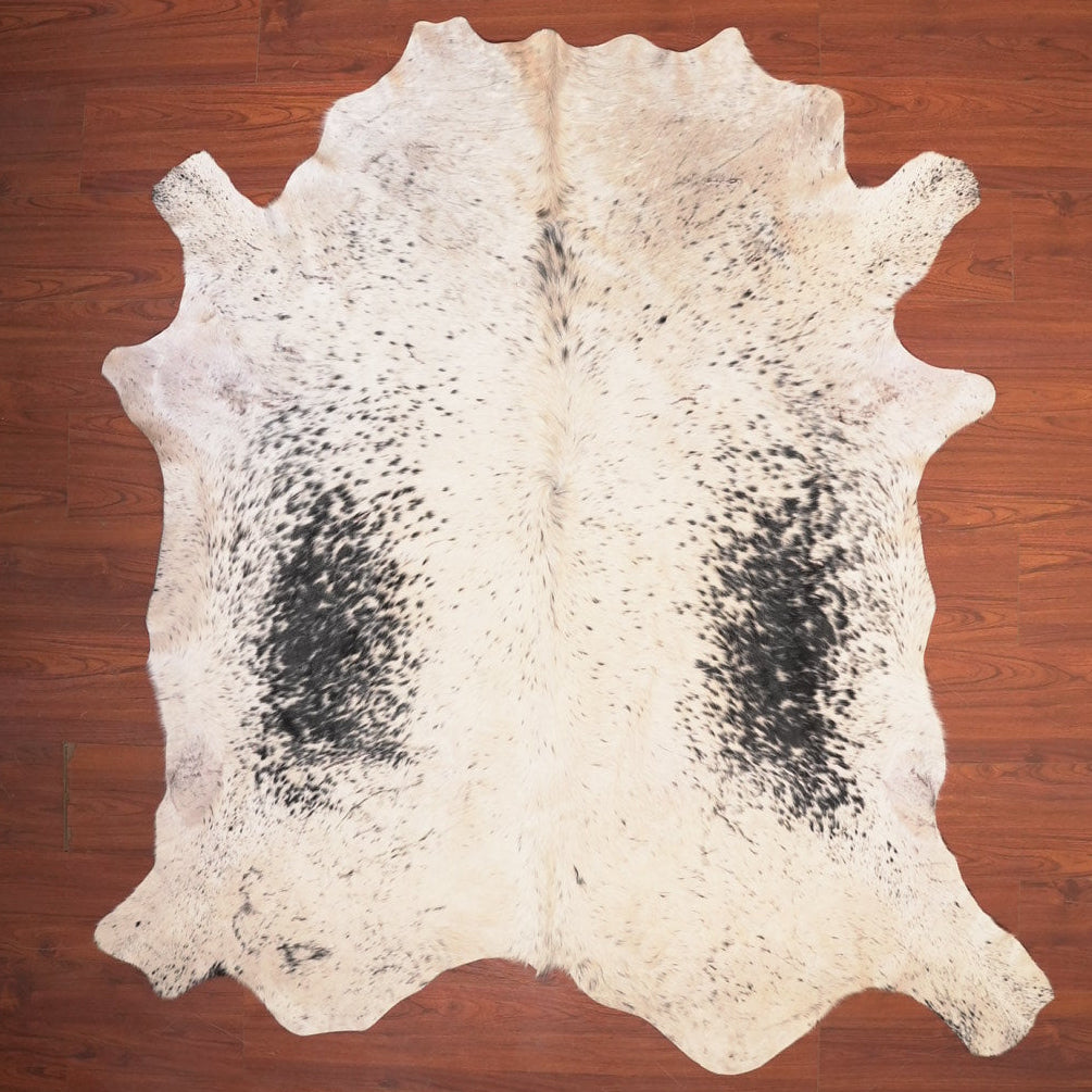 The Nguni Guy Nguni cowhide African decor Authentic cowhide Home decor Interior design Unique pattern Hand-selected Premium quality Natural beauty Exotic rug Genuine hide Statement piece Contemporary style Ethically sourced Sustainable decor Versatile accent Luxury rug Designer piece Modern aesthetic High-end craftsmanship Timeless elegance Designer home accents