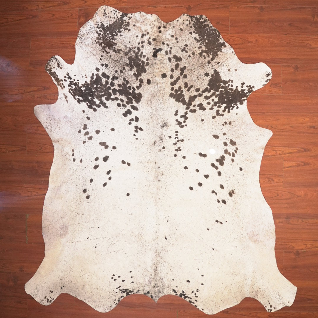 The Nguni Guy Nguni cowhide African decor Authentic cowhide Home decor Interior design Unique pattern Hand-selected Premium quality Natural beauty Exotic rug Genuine hide Statement piece Contemporary style Ethically sourced Sustainable decor Versatile accent Luxury rug Designer piece Modern aesthetic High-end craftsmanship Timeless elegance Designer home accents