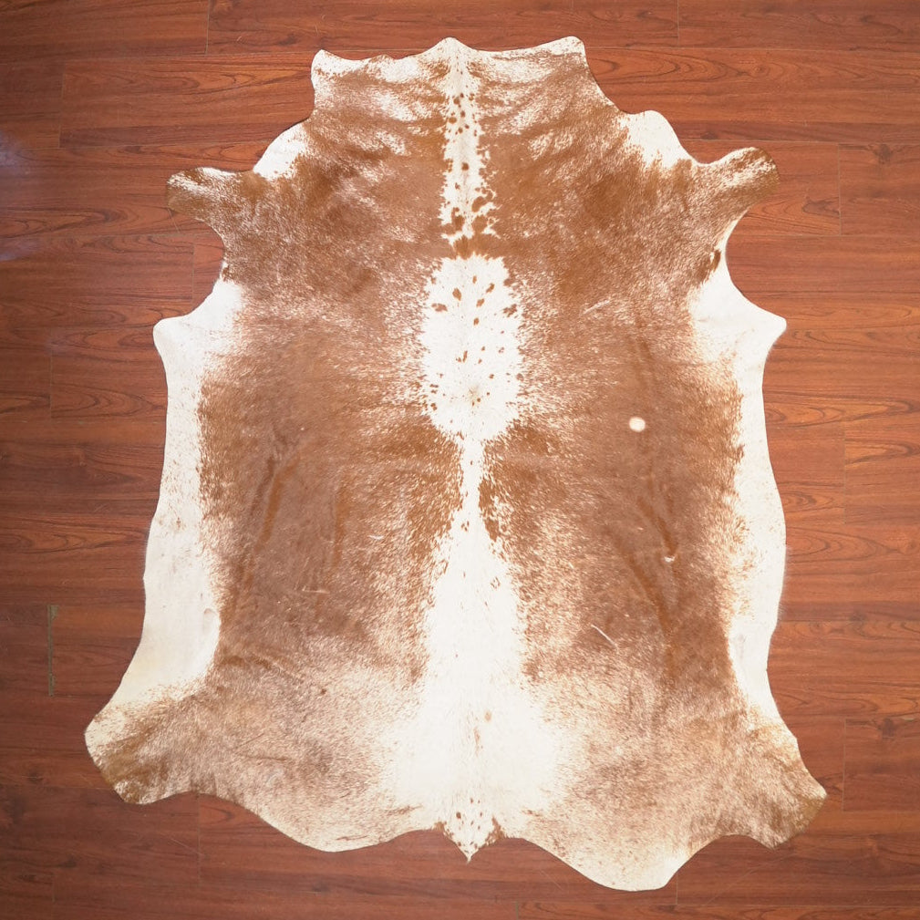 The Nguni Guy Nguni cowhide African decor Authentic cowhide Home decor Interior design Unique pattern Hand-selected Premium quality Natural beauty Exotic rug Genuine hide Statement piece Contemporary style Ethically sourced Sustainable decor Versatile accent Luxury rug Designer piece Modern aesthetic High-end craftsmanship Timeless elegance Designer home accents