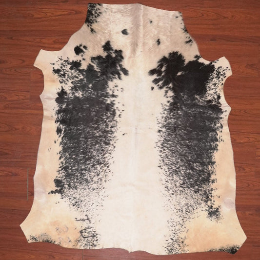 cwo hide rug on wood floor