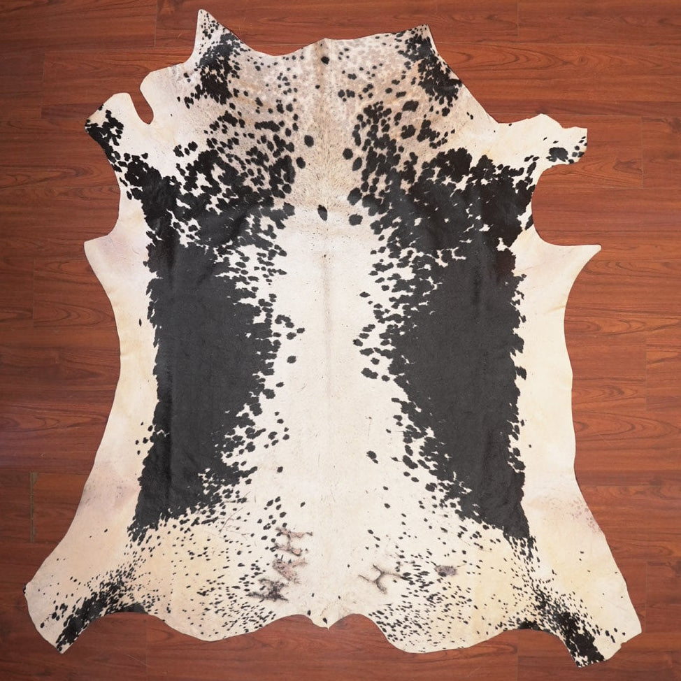 The Nguni Guy Nguni cowhide African decor Authentic cowhide Home decor Interior design Unique pattern Hand-selected Premium quality Natural beauty Exotic rug Genuine hide Statement piece Contemporary style Ethically sourced Sustainable decor Versatile accent Luxury rug Designer piece Modern aesthetic High-end craftsmanship Timeless elegance Designer home accents