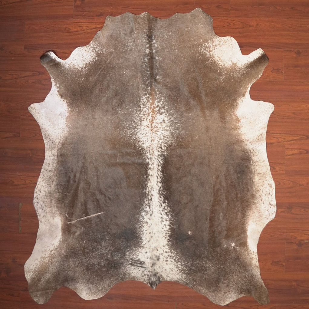 The Nguni Guy Nguni cowhide African decor Authentic cowhide Home decor Interior design Unique pattern Hand-selected Premium quality Natural beauty Exotic rug Genuine hide Statement piece Contemporary style Ethically sourced Sustainable decor Versatile accent Luxury rug Designer piece Modern aesthetic High-end craftsmanship Timeless elegance Designer home accents