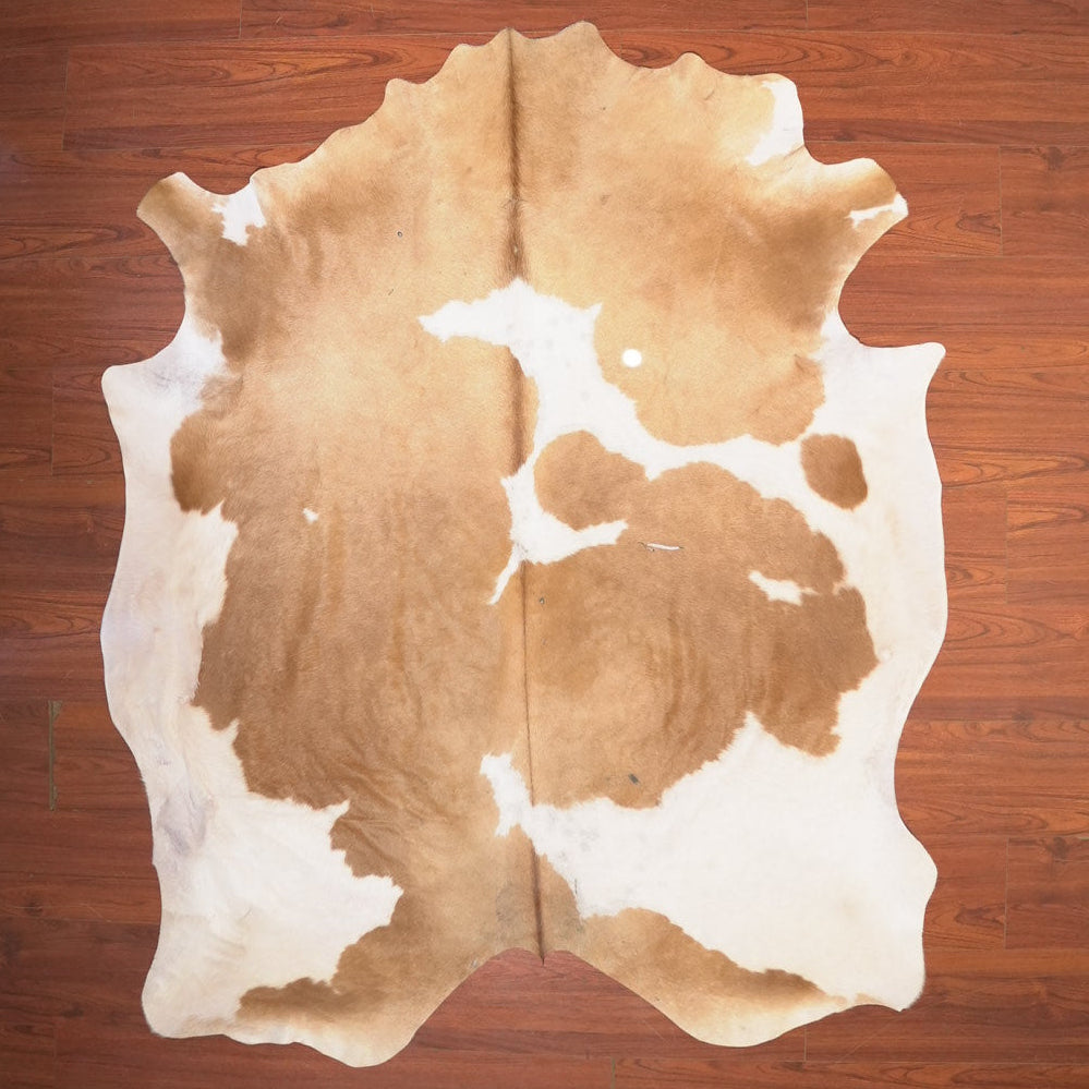 The Nguni Guy Nguni cowhide African decor Authentic cowhide Home decor Interior design Unique pattern Hand-selected Premium quality Natural beauty Exotic rug Genuine hide Statement piece Contemporary style Ethically sourced Sustainable decor Versatile accent Luxury rug Designer piece Modern aesthetic High-end craftsmanship Timeless elegance Designer home accents