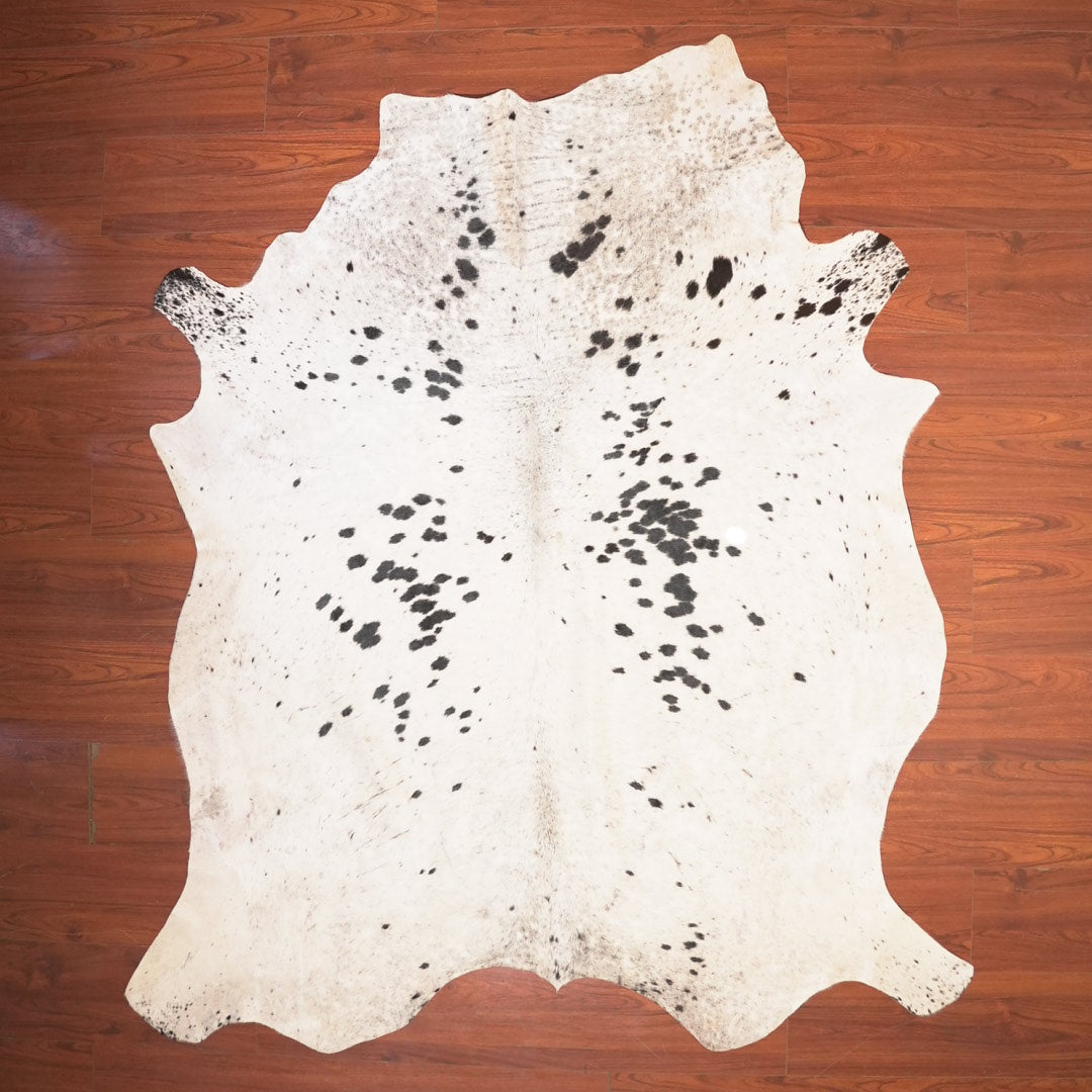 The Nguni Guy Nguni cowhide African decor Authentic cowhide Home decor Interior design Unique pattern Hand-selected Premium quality Natural beauty Exotic rug Genuine hide Statement piece Contemporary style Ethically sourced Sustainable decor Versatile accent Luxury rug Designer piece Modern aesthetic High-end craftsmanship Timeless elegance Designer home accents