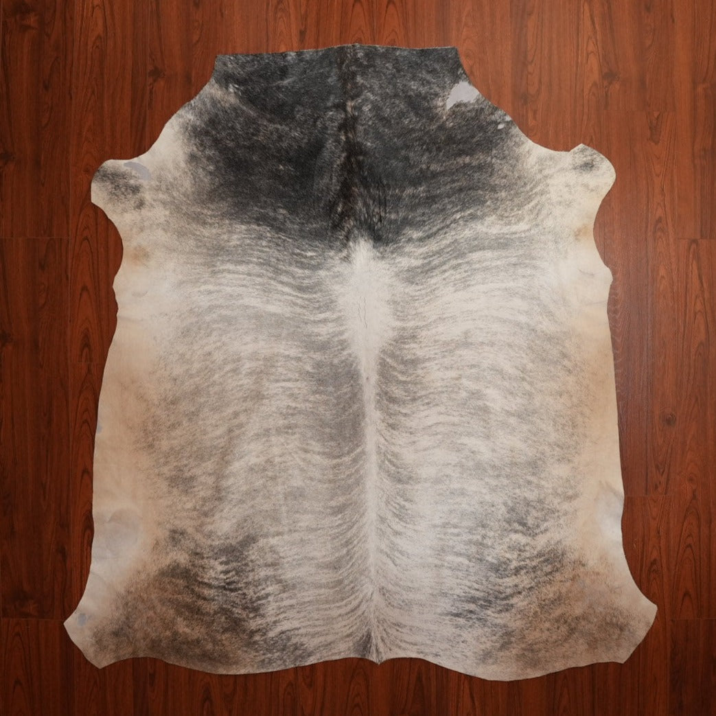 The Nguni Guy Nguni cowhide Black and white cowhide Speckled cowhide African decor Authentic cowhide Home decor Interior design Unique pattern Hand-selected Premium quality Natural beauty Exotic rug Genuine hide Statement piece Contemporary style Ethically sourced Sustainable decor Versatile accent Luxury rug Designer piece Modern aesthetic High-end craftsmanship Timeless elegance Designer home accents