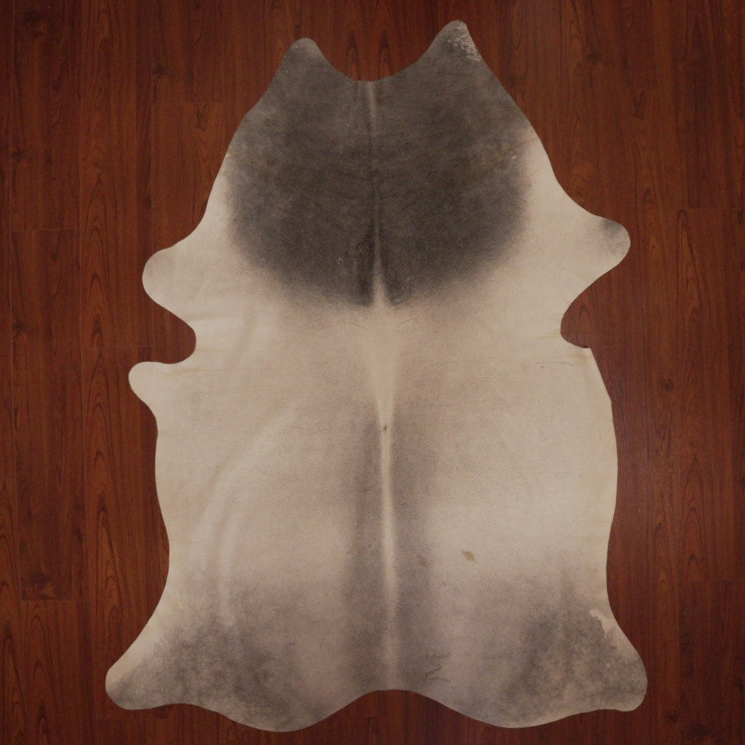 The Nguni Guy Nguni cowhide Black and white cowhide Speckled cowhide African decor Authentic cowhide Home decor Interior design Unique pattern Hand-selected Premium quality Natural beauty Exotic rug Genuine hide Statement piece Contemporary style Ethically sourced Sustainable decor Versatile accent Luxury rug Designer piece Modern aesthetic High-end craftsmanship Timeless elegance Designer home accents