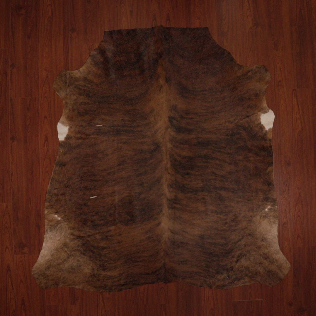 The Nguni Guy Nguni cowhide Black and white cowhide Speckled cowhide African decor Authentic cowhide Home decor Interior design Unique pattern Hand-selected Premium quality Natural beauty Exotic rug Genuine hide Statement piece Contemporary style Ethically sourced Sustainable decor Versatile accent Luxury rug Designer piece Modern aesthetic High-end craftsmanship Timeless elegance Designer home accents