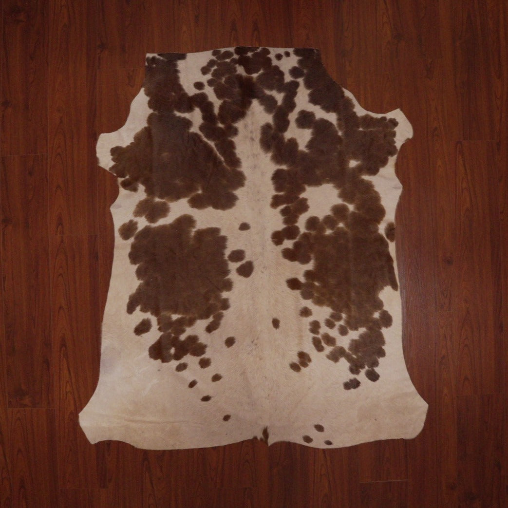 The Nguni Guy Nguni cowhide Black and white cowhide Speckled cowhide African decor Authentic cowhide Home decor Interior design Unique pattern Hand-selected Premium quality Natural beauty Exotic rug Genuine hide Statement piece Contemporary style Ethically sourced Sustainable decor Versatile accent Luxury rug Designer piece Modern aesthetic High-end craftsmanship Timeless elegance Designer home accents