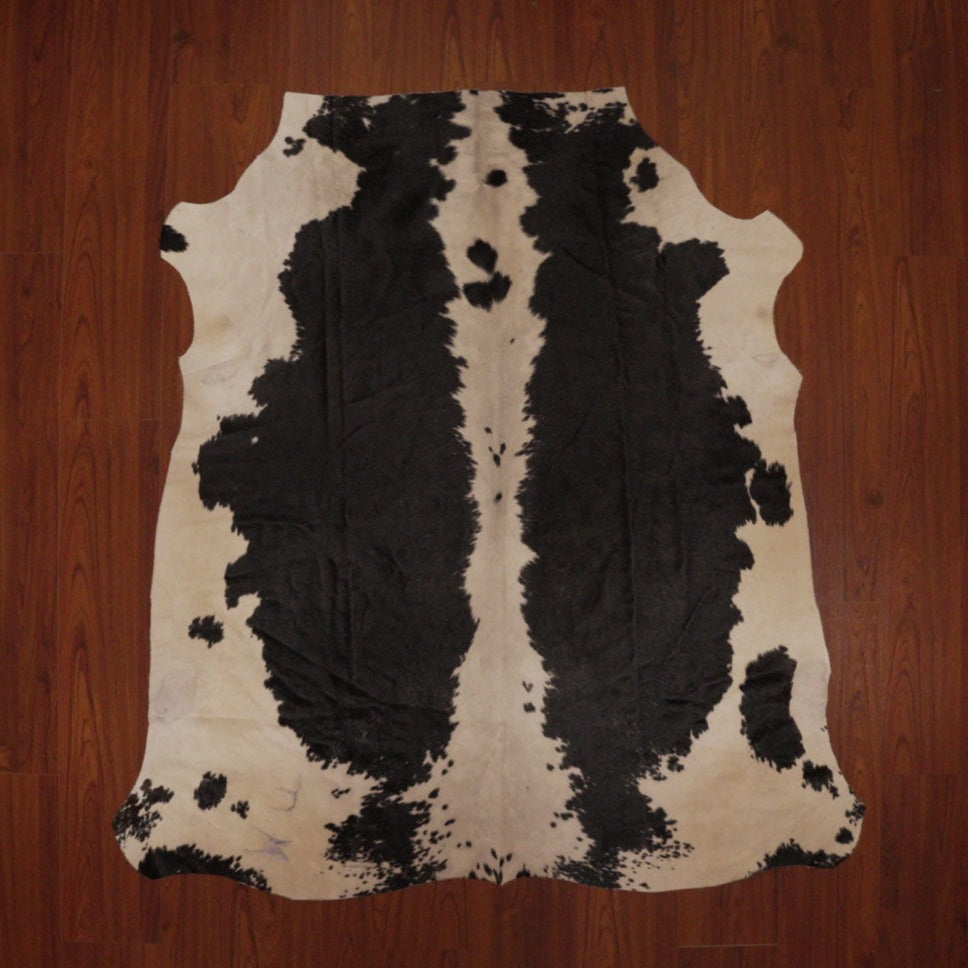 The Nguni Guy Nguni cowhide Black and white cowhide Speckled cowhide African decor Authentic cowhide Home decor Interior design Unique pattern Hand-selected Premium quality Natural beauty Exotic rug Genuine hide Statement piece Contemporary style Ethically sourced Sustainable decor Versatile accent Luxury rug Designer piece Modern aesthetic High-end craftsmanship Timeless elegance Designer home accents