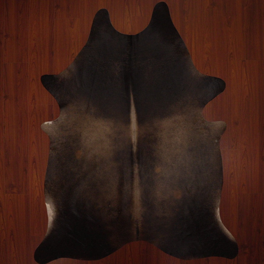 The Nguni Guy Nguni cowhide African decor Authentic cowhide Home decor Interior design Unique pattern Hand-selected Premium quality Natural beauty Exotic rug Genuine hide Statement piece Contemporary style Ethically sourced Sustainable decor Versatile accent Luxury rug Designer piece Modern aesthetic High-end craftsmanship Timeless elegance Designer home accents