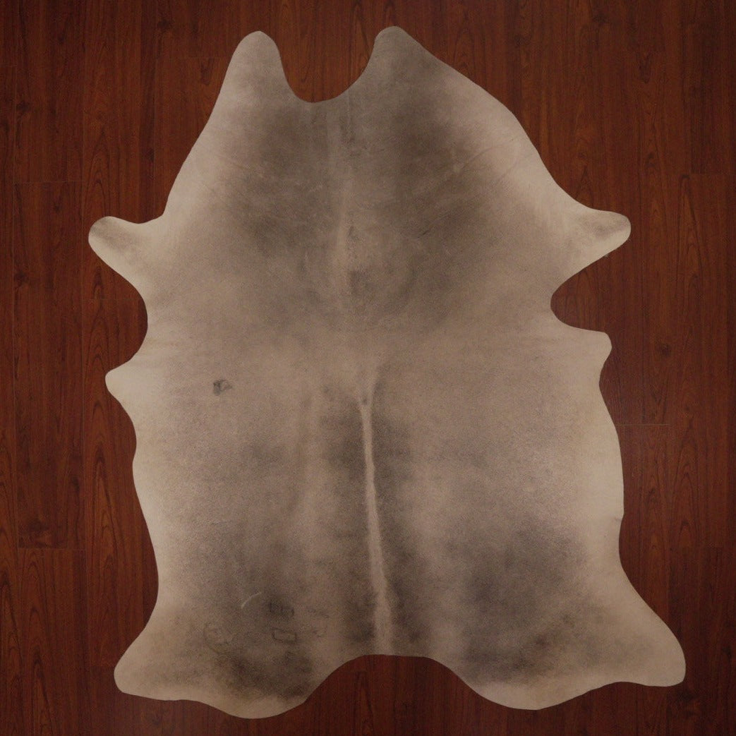 The Nguni Guy Nguni cowhide African decor Authentic cowhide Home decor Interior design Unique pattern Hand-selected Premium quality Natural beauty Exotic rug Genuine hide Statement piece Contemporary style Ethically sourced Sustainable decor Versatile accent Luxury rug Designer piece Modern aesthetic High-end craftsmanship Timeless elegance Designer home accents