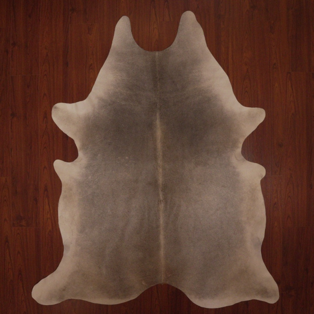 The Nguni Guy Nguni cowhide African decor Authentic cowhide Home decor Interior design Unique pattern Hand-selected Premium quality Natural beauty Exotic rug Genuine hide Statement piece Contemporary style Ethically sourced Sustainable decor Versatile accent Luxury rug Designer piece Modern aesthetic High-end craftsmanship Timeless elegance Designer home accents