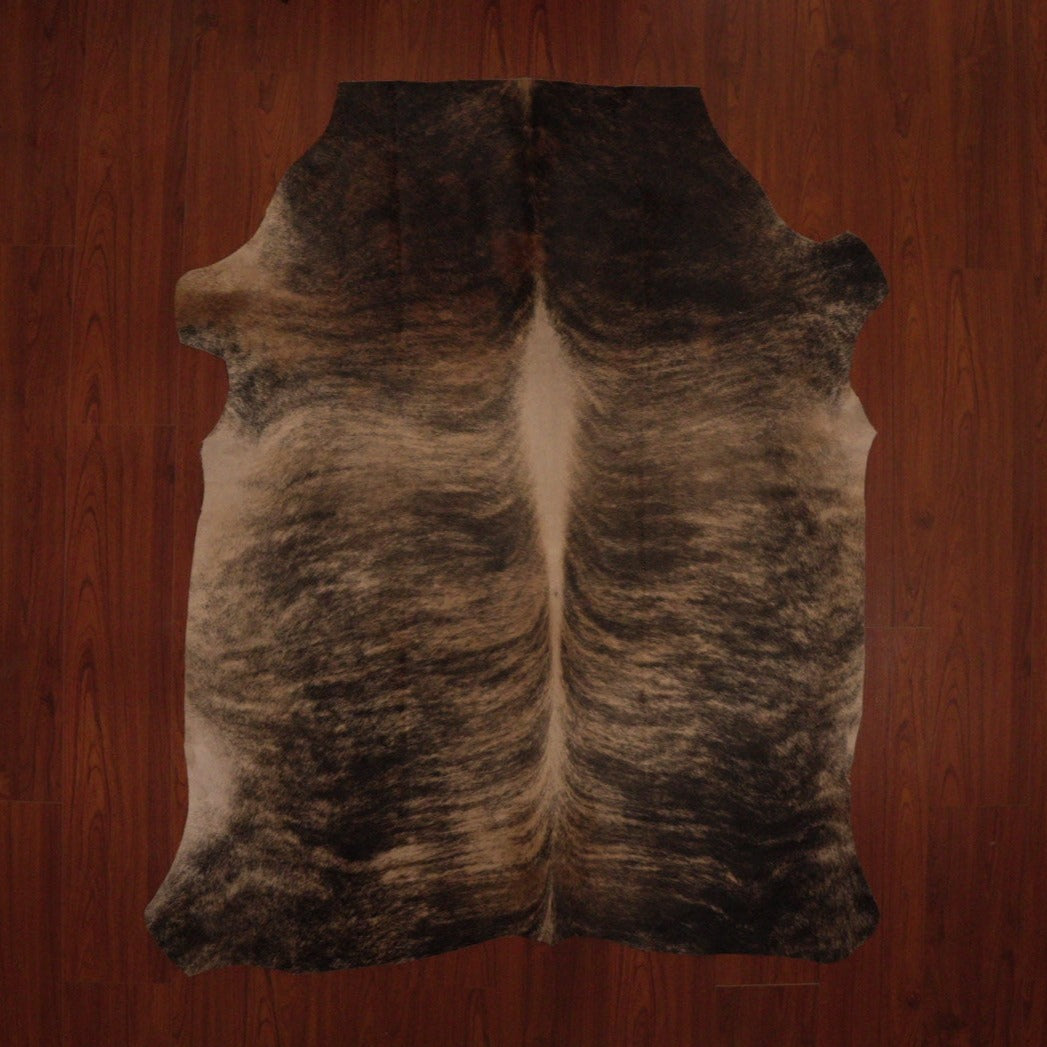 The Nguni Guy Nguni cowhide Brown and white cowhide Speckled cowhide African decor Authentic cowhide Home decor Interior design Unique pattern Hand-selected Premium quality Natural beauty Exotic rug Genuine hide Statement piece Contemporary style Ethically sourced Sustainable decor Versatile accent Luxury rug Designer piece Modern aesthetic High-end craftsmanship Timeless elegance Designer home accents