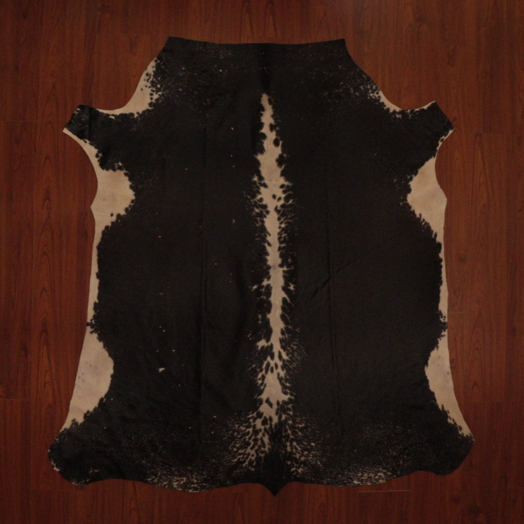 The Nguni Guy Nguni cowhide African decor Authentic cowhide Home decor Interior design Unique pattern Hand-selected Premium quality Natural beauty Exotic rug Genuine hide Statement piece Contemporary style Ethically sourced Sustainable decor Versatile accent Luxury rug Designer piece Modern aesthetic High-end craftsmanship Timeless elegance Designer home accents
