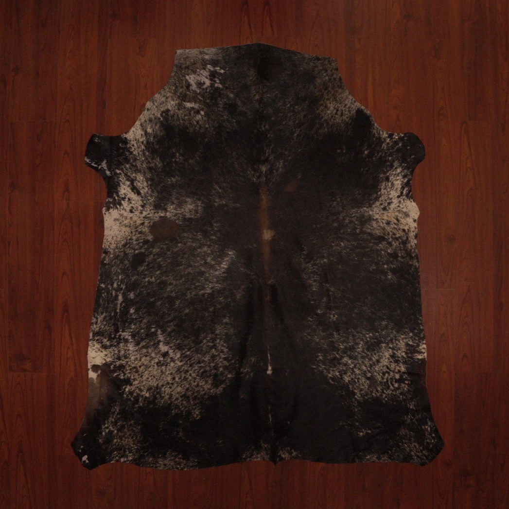 The Nguni Guy Nguni cowhide African decor Authentic cowhide Home decor Interior design Unique pattern Hand-selected Premium quality Natural beauty Exotic rug Genuine hide Statement piece Contemporary style Ethically sourced Sustainable decor Versatile accent Luxury rug Designer piece Modern aesthetic High-end craftsmanship Timeless elegance Designer home accents