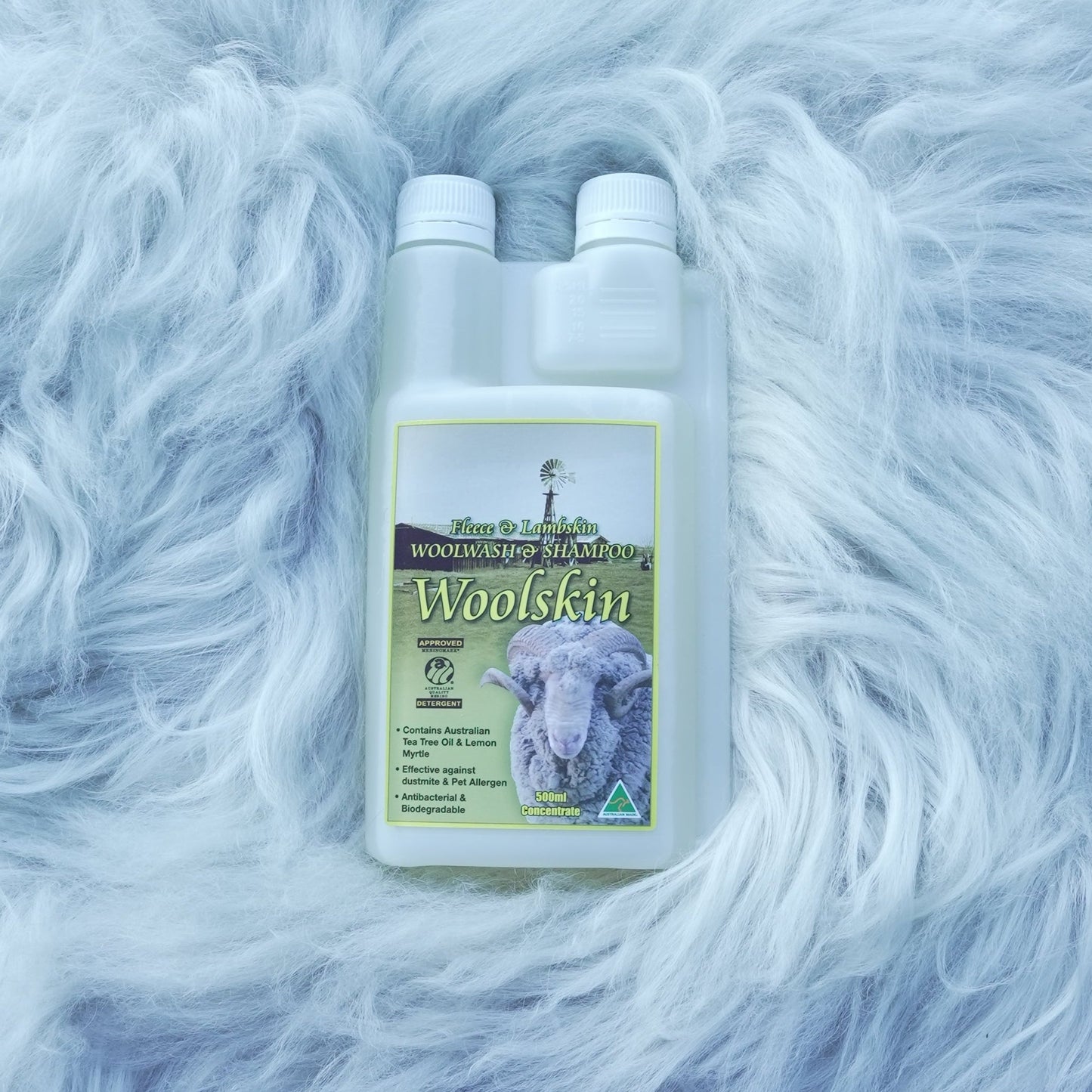 Bottled woolwash shampoo on sheepskin