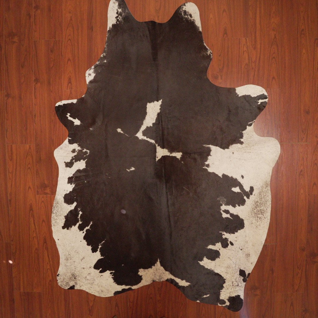 The Nguni Guy Nguni cowhide African decor Authentic cowhide Home decor Interior design Unique pattern Hand-selected Premium quality Natural beauty Exotic rug Genuine hide Statement piece Contemporary style Ethically sourced Sustainable decor Versatile accent Luxury rug Designer piece Modern aesthetic High-end craftsmanship Timeless elegance Designer home accents