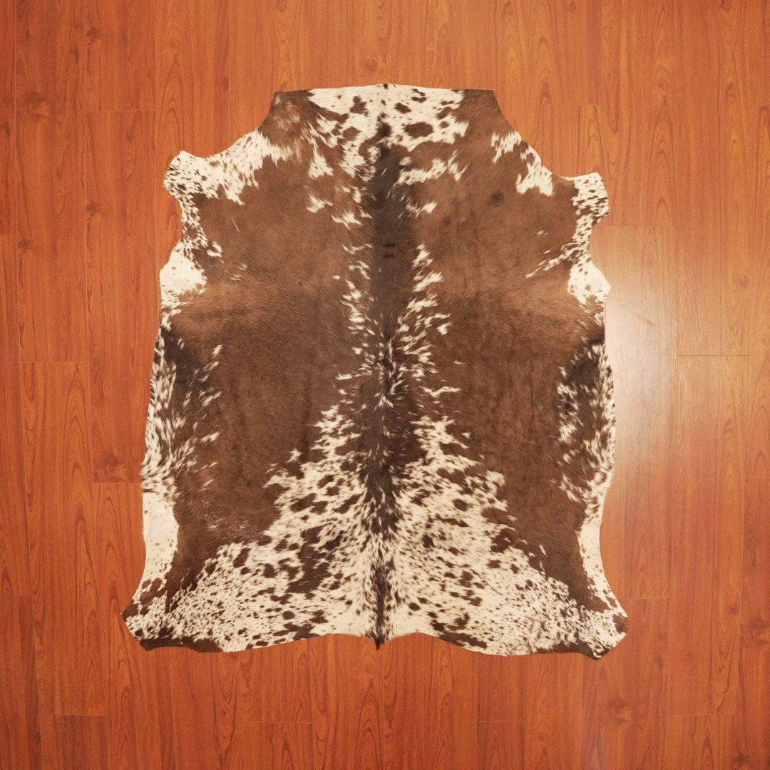 The Nguni Guy Nguni cowhide African decor Authentic cowhide Home decor Interior design Unique pattern Hand-selected Premium quality Natural beauty Exotic rug Genuine hide Statement piece Contemporary style Ethically sourced Sustainable decor Versatile accent Luxury rug Designer piece Modern aesthetic High-end craftsmanship Timeless elegance Designer home accents