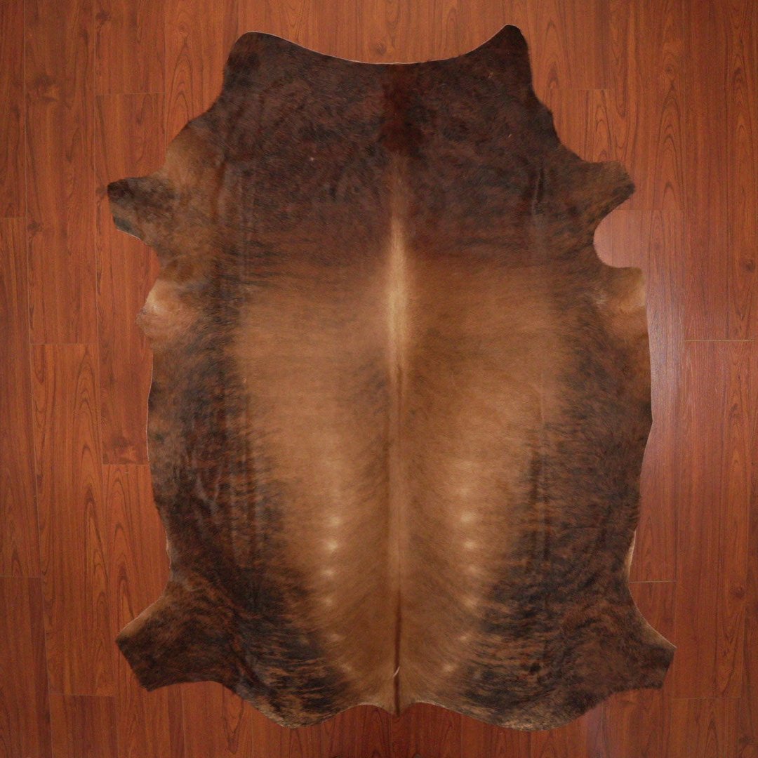 The Nguni Guy Nguni cowhide African decor Authentic cowhide Home decor Interior design Unique pattern Hand-selected Premium quality Natural beauty Exotic rug Genuine hide Statement piece Contemporary style Ethically sourced Sustainable decor Versatile accent Luxury rug Designer piece Modern aesthetic High-end craftsmanship Timeless elegance Designer home accents