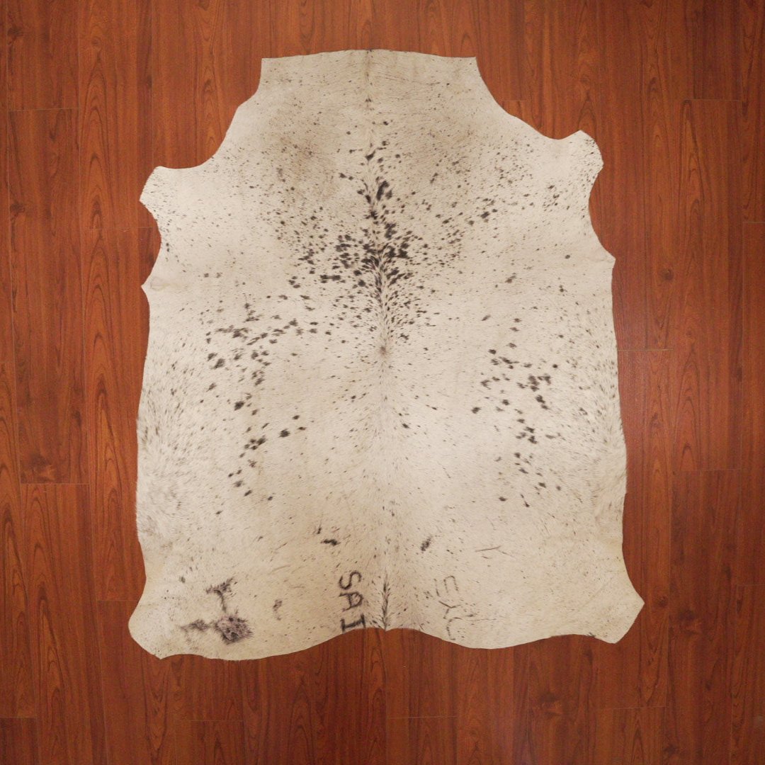 The Nguni Guy Nguni cowhide African decor Authentic cowhide Home decor Interior design Unique pattern Hand-selected Premium quality Natural beauty Exotic rug Genuine hide Statement piece Contemporary style Ethically sourced Sustainable decor Versatile accent Luxury rug Designer piece Modern aesthetic High-end craftsmanship Timeless elegance Designer home accents