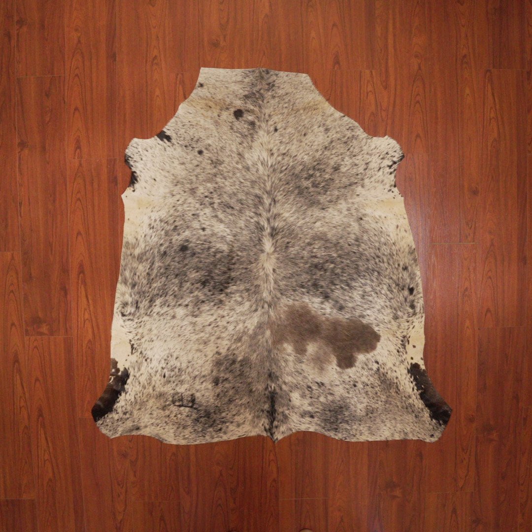 The Nguni Guy Nguni cowhide African decor Authentic cowhide Home decor Interior design Unique pattern Hand-selected Premium quality Natural beauty Exotic rug Genuine hide Statement piece Contemporary style Ethically sourced Sustainable decor Versatile accent Luxury rug Designer piece Modern aesthetic High-end craftsmanship Timeless elegance Designer home accents