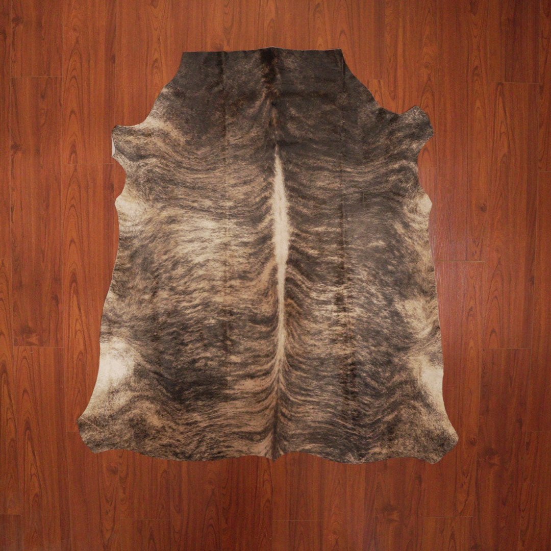 The Nguni Guy Nguni cowhide African decor Authentic cowhide Home decor Interior design Unique pattern Hand-selected Premium quality Natural beauty Exotic rug Genuine hide Statement piece Contemporary style Ethically sourced Sustainable decor Versatile accent Luxury rug Designer piece Modern aesthetic High-end craftsmanship Timeless elegance Designer home accents
