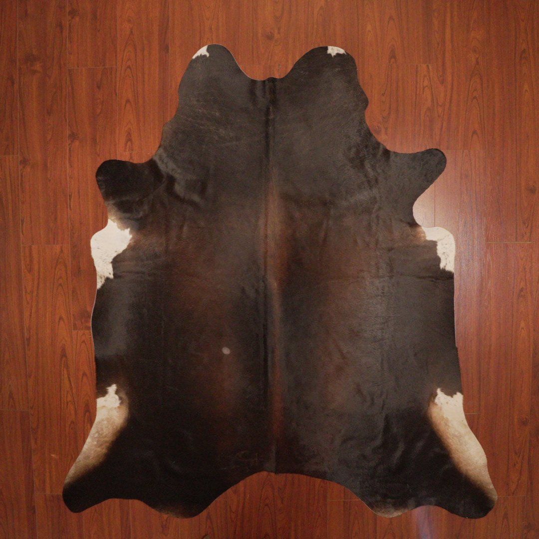 The Nguni Guy Nguni cowhide African decor Authentic cowhide Home decor Interior design Unique pattern Hand-selected Premium quality Natural beauty Exotic rug Genuine hide Statement piece Contemporary style Ethically sourced Sustainable decor Versatile accent Luxury rug Designer piece Modern aesthetic High-end craftsmanship Timeless elegance Designer home accents