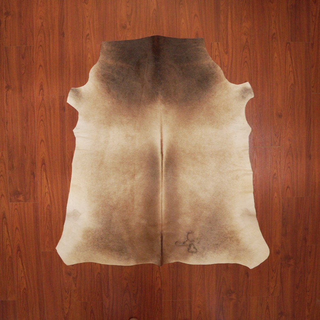 The Nguni Guy Nguni cowhide African decor Authentic cowhide Home decor Interior design Unique pattern Hand-selected Premium quality Natural beauty Exotic rug Genuine hide Statement piece Contemporary style Ethically sourced Sustainable decor Versatile accent Luxury rug Designer piece Modern aesthetic High-end craftsmanship Timeless elegance Designer home accents