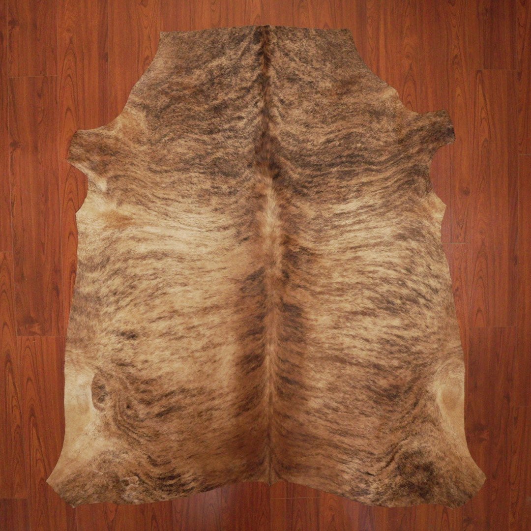 The Nguni Guy Nguni cowhide African decor Authentic cowhide Home decor Interior design Unique pattern Hand-selected Premium quality Natural beauty Exotic rug Genuine hide Statement piece Contemporary style Ethically sourced Sustainable decor Versatile accent Luxury rug Designer piece Modern aesthetic High-end craftsmanship Timeless elegance Designer home accents
