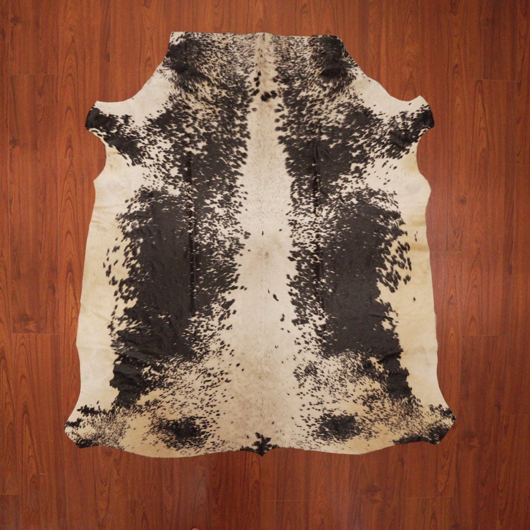 The Nguni Guy Nguni cowhide African decor Authentic cowhide Home decor Interior design Unique pattern Hand-selected Premium quality Natural beauty Exotic rug Genuine hide Statement piece Contemporary style Ethically sourced Sustainable decor Versatile accent Luxury rug Designer piece Modern aesthetic High-end craftsmanship Timeless elegance Designer home accents