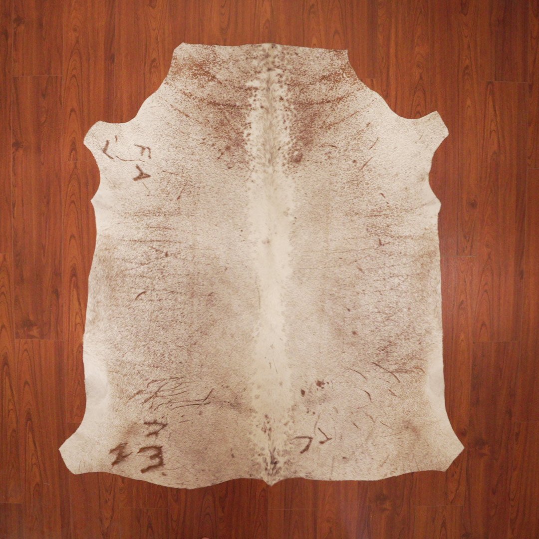 The Nguni Guy Nguni cowhide African decor Authentic cowhide Home decor Interior design Unique pattern Hand-selected Premium quality Natural beauty Exotic rug Genuine hide Statement piece Contemporary style Ethically sourced Sustainable decor Versatile accent Luxury rug Designer piece Modern aesthetic High-end craftsmanship Timeless elegance Designer home accents