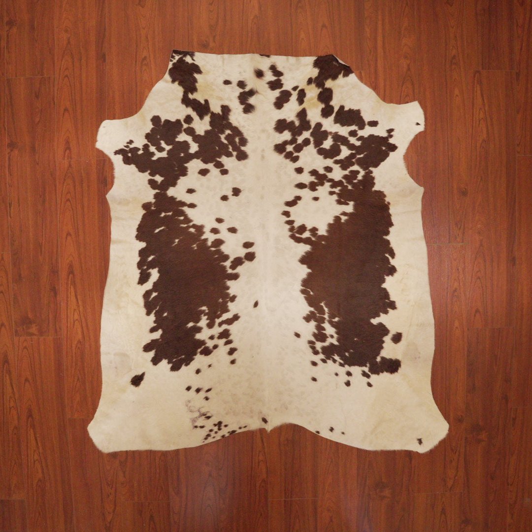 The Nguni Guy Nguni cowhide African decor Authentic cowhide Home decor Interior design Unique pattern Hand-selected Premium quality Natural beauty Exotic rug Genuine hide Statement piece Contemporary style Ethically sourced Sustainable decor Versatile accent Luxury rug Designer piece Modern aesthetic High-end craftsmanship Timeless elegance Designer home accents