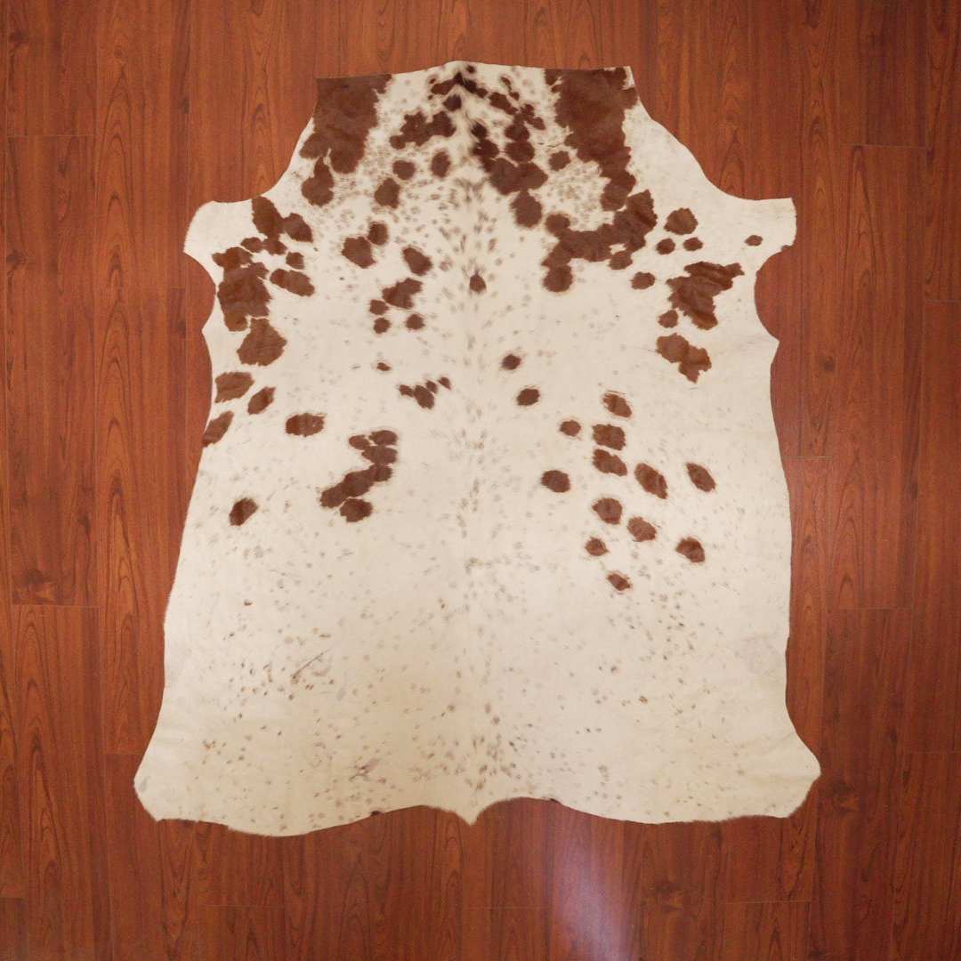 The Nguni Guy Nguni cowhide African decor Authentic cowhide Home decor Interior design Unique pattern Hand-selected Premium quality Natural beauty Exotic rug Genuine hide Statement piece Contemporary style Ethically sourced Sustainable decor Versatile accent Luxury rug Designer piece Modern aesthetic High-end craftsmanship Timeless elegance Designer home accents
