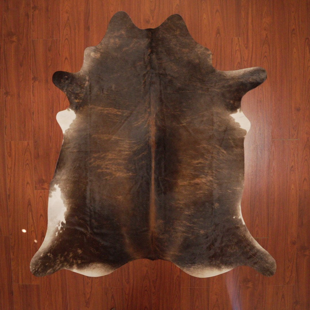 The Nguni Guy Nguni cowhide African decor Authentic cowhide Home decor Interior design Unique pattern Hand-selected Premium quality Natural beauty Exotic rug Genuine hide Statement piece Contemporary style Ethically sourced Sustainable decor Versatile accent Luxury rug Designer piece Modern aesthetic High-end craftsmanship Timeless elegance Designer home accents