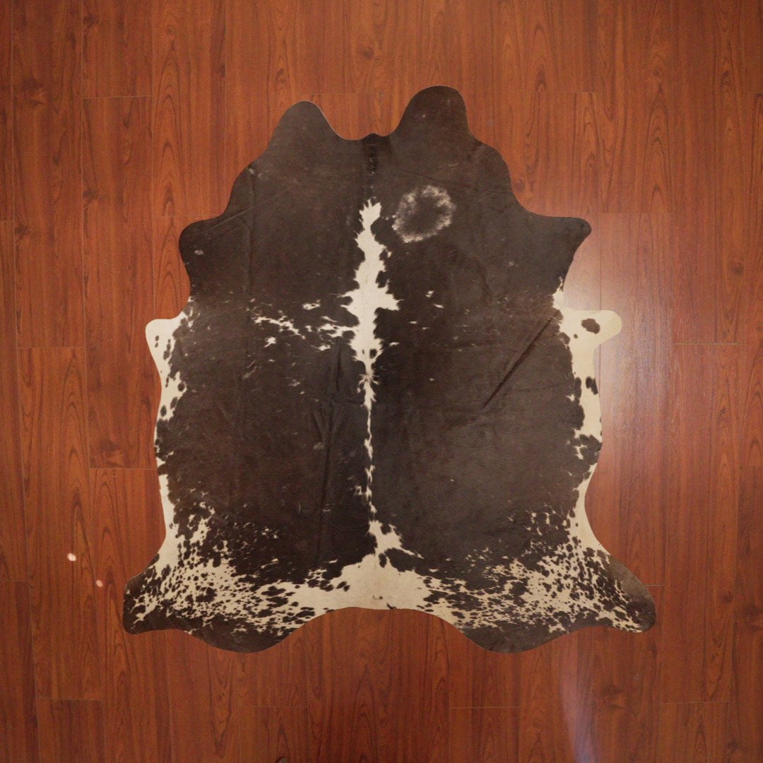 The Nguni Guy Nguni cowhide African decor Authentic cowhide Home decor Interior design Unique pattern Hand-selected Premium quality Natural beauty Exotic rug Genuine hide Statement piece Contemporary style Ethically sourced Sustainable decor Versatile accent Luxury rug Designer piece Modern aesthetic High-end craftsmanship Timeless elegance Designer home accents