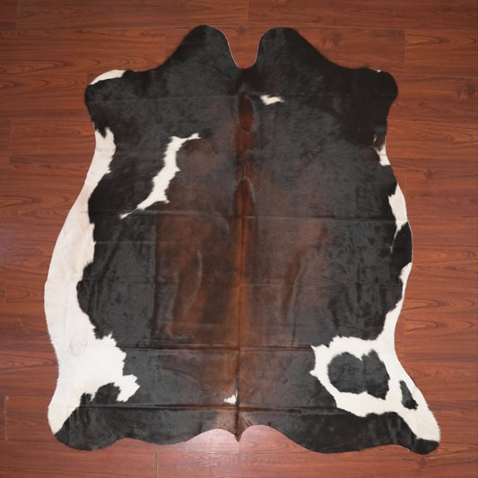 The Nguni Guy Nguni cowhide African decor Authentic cowhide Home decor Interior design Unique pattern Hand-selected Premium quality Natural beauty Exotic rug Genuine hide Statement piece Contemporary style Ethically sourced Sustainable decor Versatile accent Luxury rug Designer piece Modern aesthetic High-end craftsmanship Timeless elegance Designer home accents