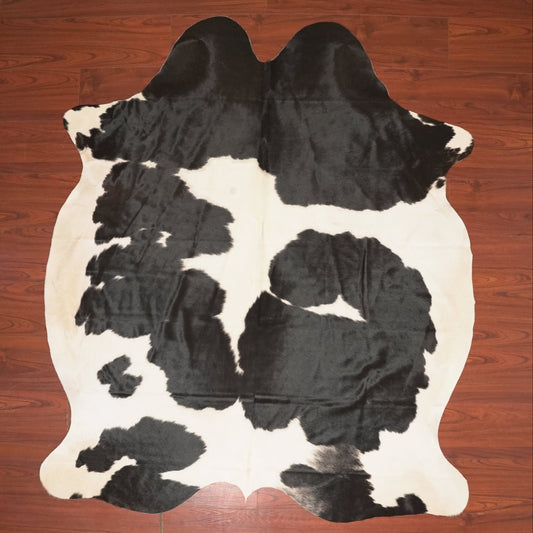 The Nguni Guy Nguni cowhide African decor Authentic cowhide Home decor Interior design Unique pattern Hand-selected Premium quality Natural beauty Exotic rug Genuine hide Statement piece Contemporary style Ethically sourced Sustainable decor Versatile accent Luxury rug Designer piece Modern aesthetic High-end craftsmanship Timeless elegance Designer home accents