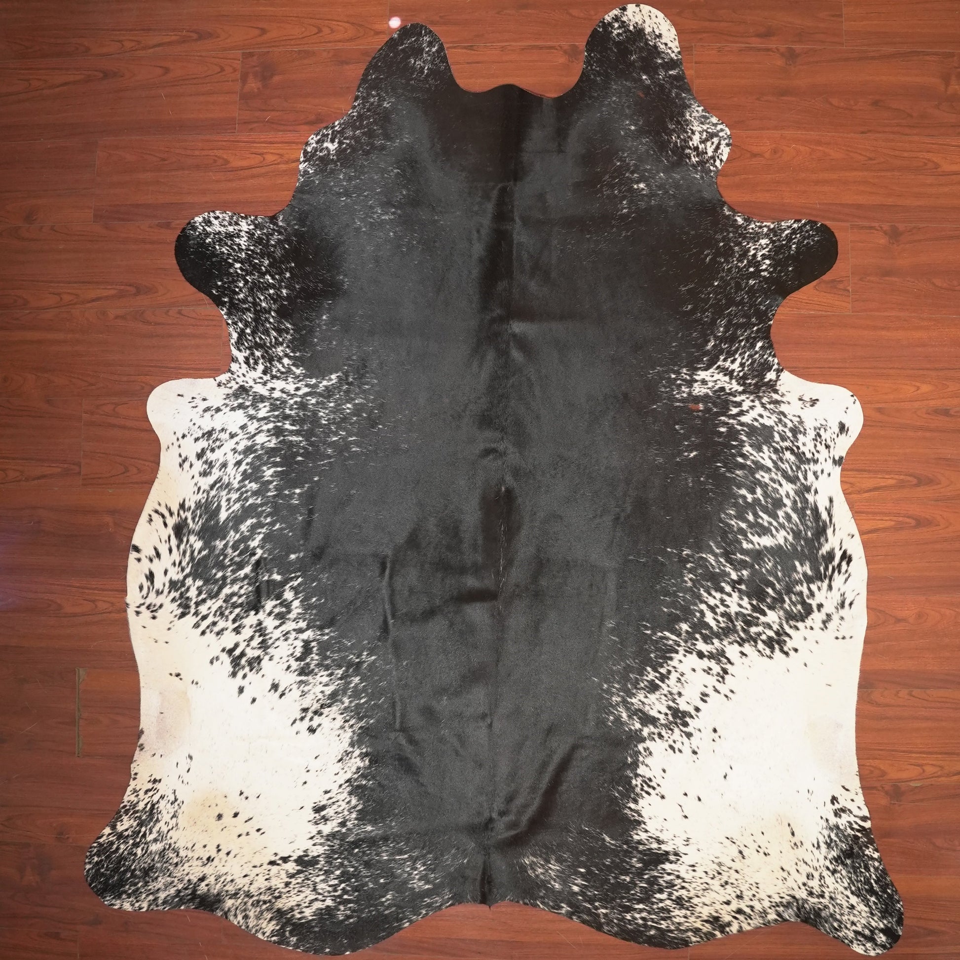 The Nguni Guy Nguni cowhide African decor Authentic cowhide Home decor Interior design Unique pattern Hand-selected Premium quality Natural beauty Exotic rug Genuine hide Statement piece Contemporary style Ethically sourced Sustainable decor Versatile accent Luxury rug Designer piece Modern aesthetic High-end craftsmanship Timeless elegance Designer home accents
