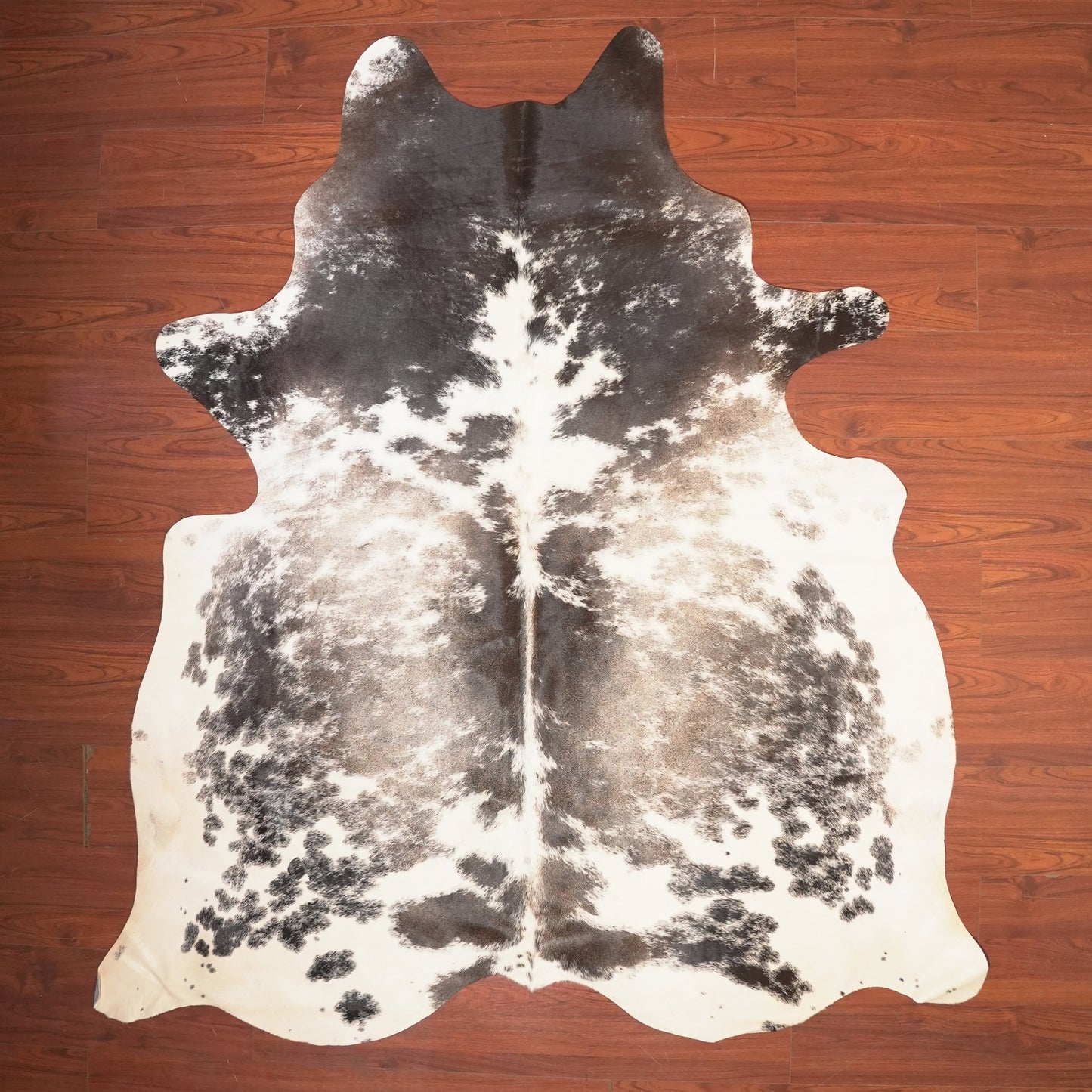 The Nguni Guy Nguni cowhide African decor Authentic cowhide Home decor Interior design Unique pattern Hand-selected Premium quality Natural beauty Exotic rug Genuine hide Statement piece Contemporary style Ethically sourced Sustainable decor Versatile accent Luxury rug Designer piece Modern aesthetic High-end craftsmanship Timeless elegance Designer home accents
