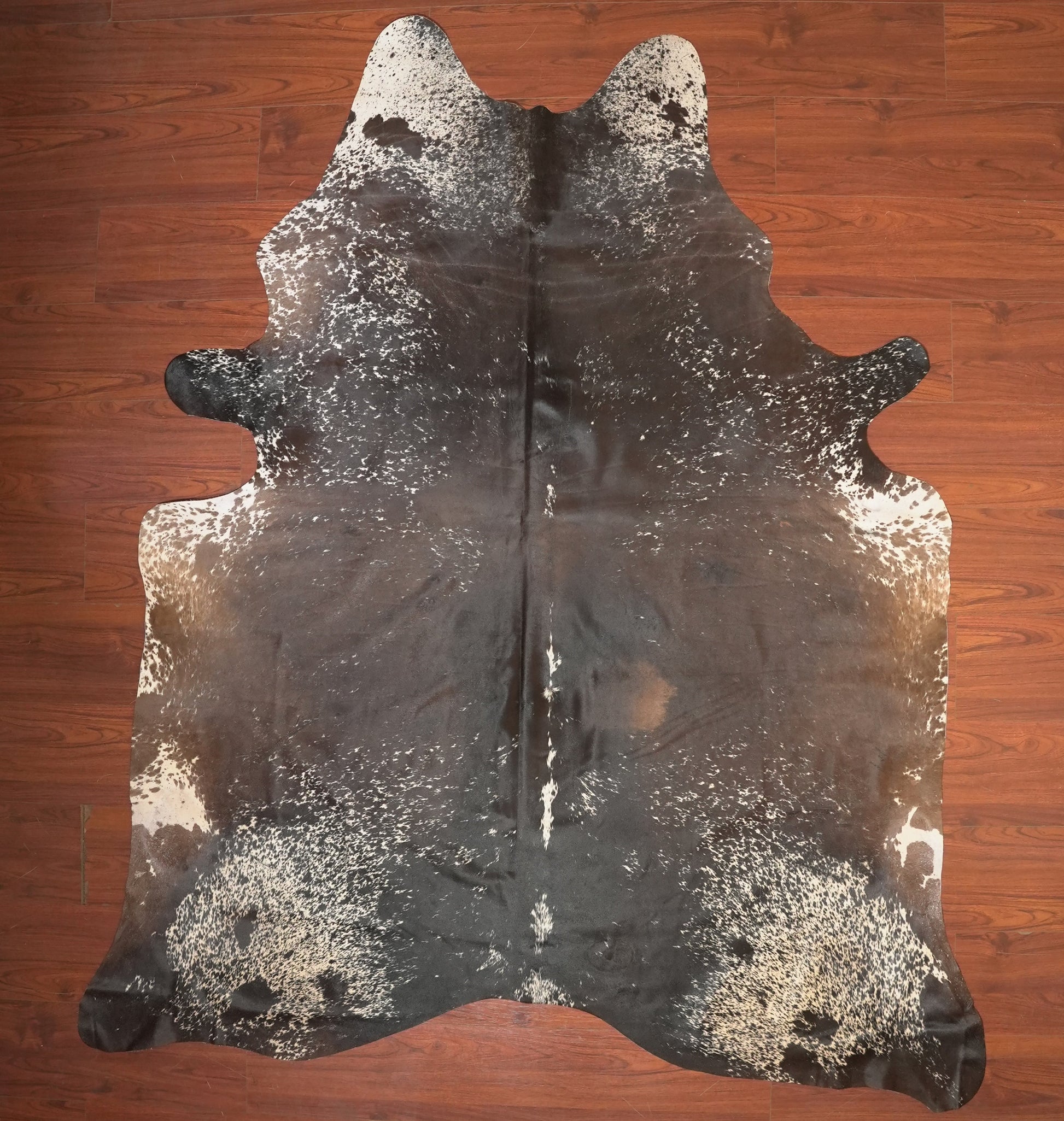 The Nguni Guy Nguni cowhide African decor Authentic cowhide Home decor Interior design Unique pattern Hand-selected Premium quality Natural beauty Exotic rug Genuine hide Statement piece Contemporary style Ethically sourced Sustainable decor Versatile accent Luxury rug Designer piece Modern aesthetic High-end craftsmanship Timeless elegance Designer home accents

