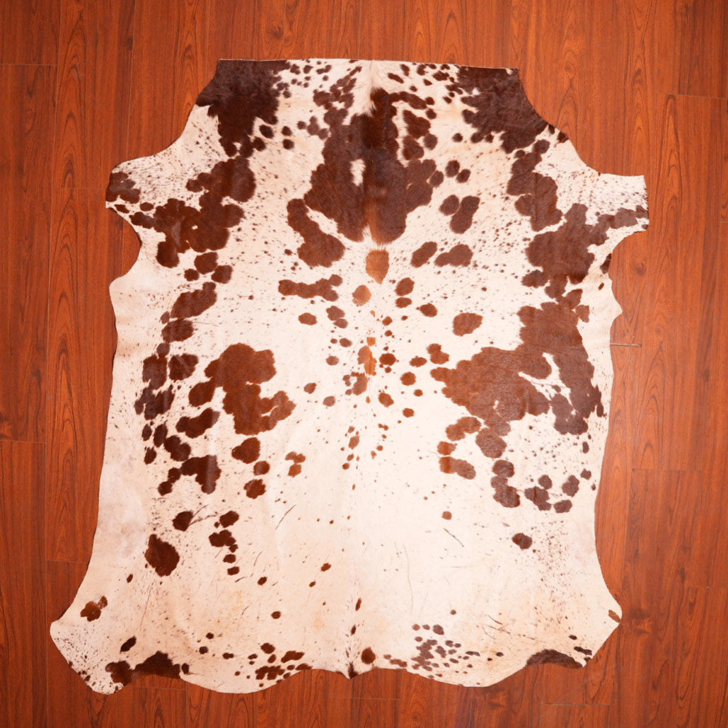 The Nguni Guy Nguni cowhide African decor Authentic cowhide Home decor Interior design Unique pattern Hand-selected Premium quality Natural beauty Exotic rug Genuine hide Statement piece Contemporary style Ethically sourced Sustainable decor Versatile accent Luxury rug Designer piece Modern aesthetic High-end craftsmanship Timeless elegance Designer home accents