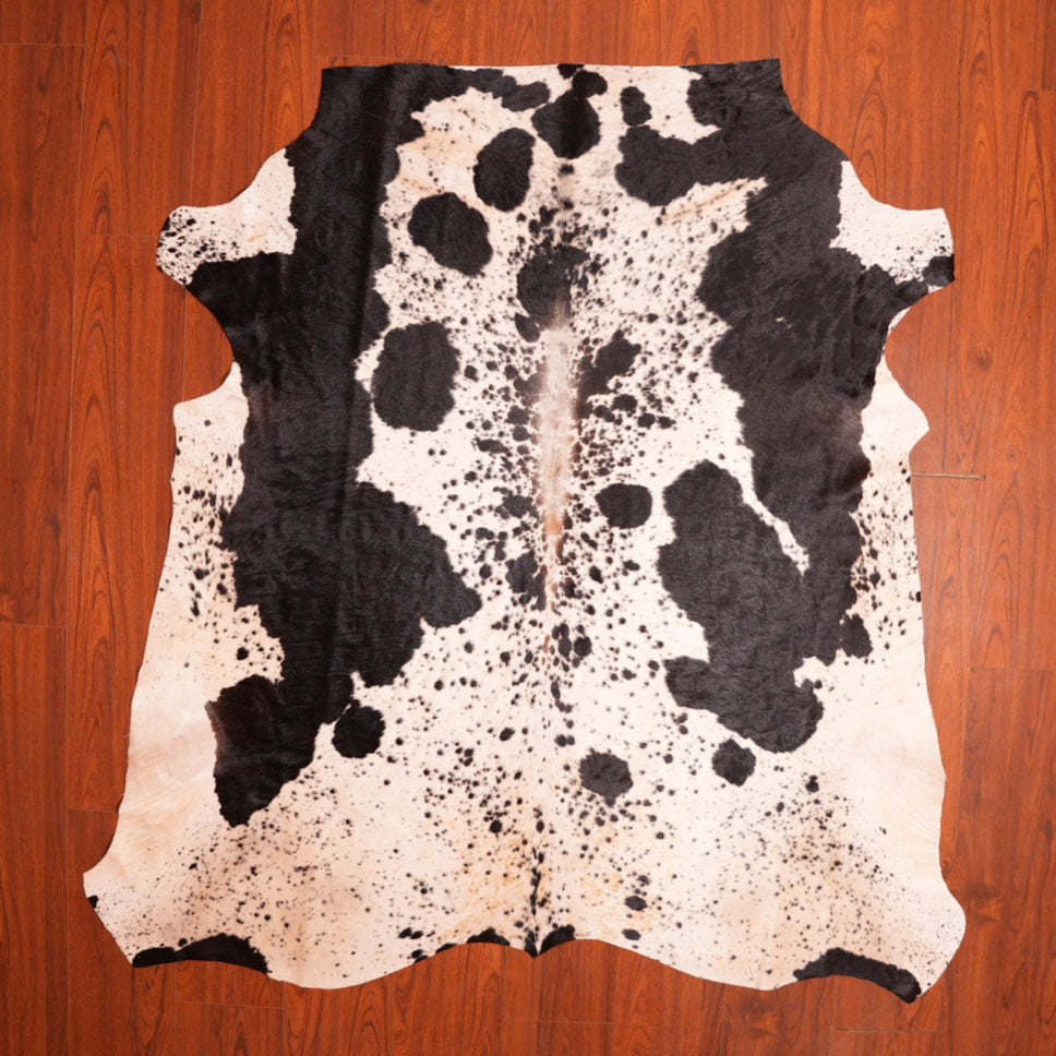 The Nguni Guy Nguni cowhide African decor Authentic cowhide Home decor Interior design Unique pattern Hand-selected Premium quality Natural beauty Exotic rug Genuine hide Statement piece Contemporary style Ethically sourced Sustainable decor Versatile accent Luxury rug Designer piece Modern aesthetic High-end craftsmanship Timeless elegance Designer home accents