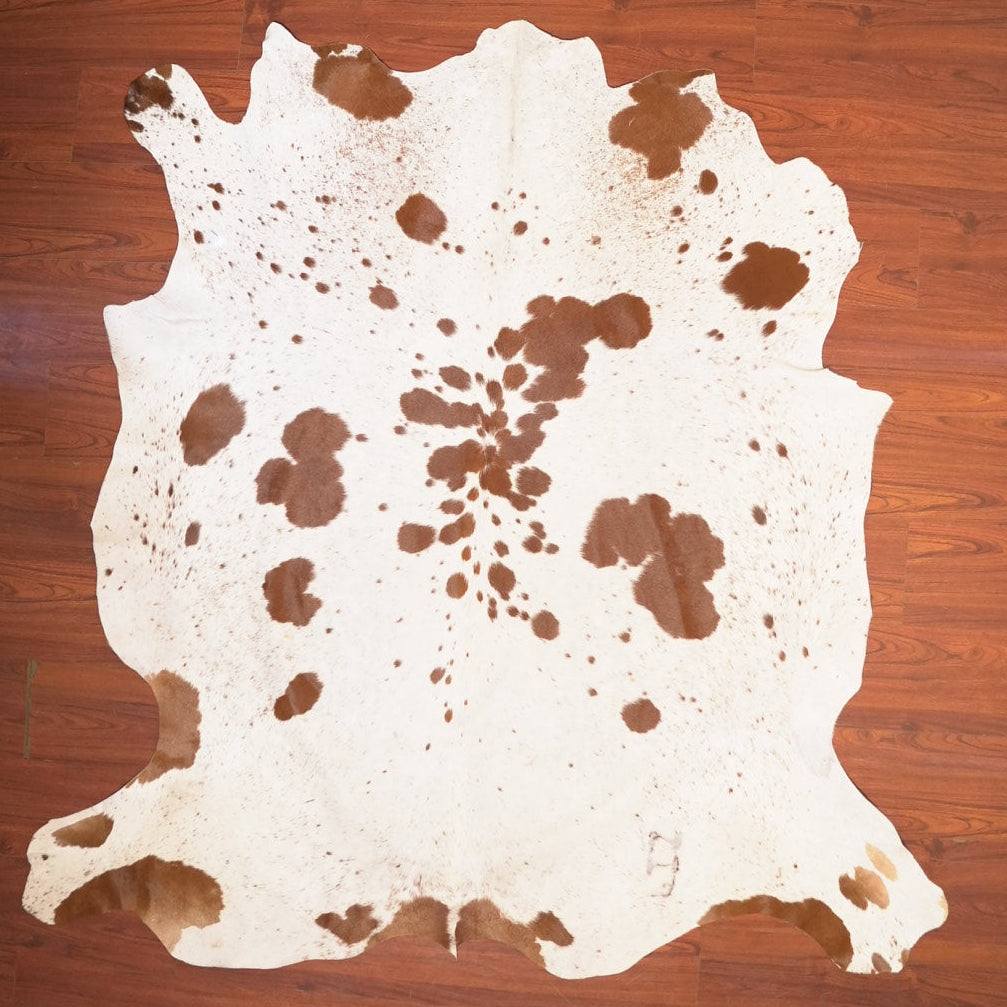 The Nguni Guy Nguni cowhide African decor Authentic cowhide Home decor Interior design Unique pattern Hand-selected Premium quality Natural beauty Exotic rug Genuine hide Statement piece Contemporary style Ethically sourced Sustainable decor Versatile accent Luxury rug Designer piece Modern aesthetic High-end craftsmanship Timeless elegance Designer home accents
