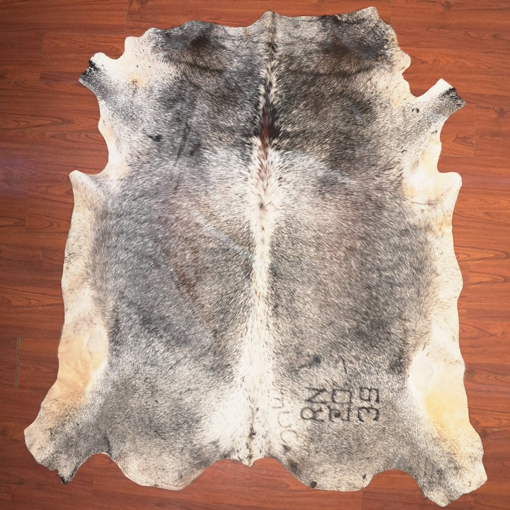 The Nguni Guy Nguni cowhide African decor Authentic cowhide Home decor Interior design Unique pattern Hand-selected Premium quality Natural beauty Exotic rug Genuine hide Statement piece Contemporary style Ethically sourced Sustainable decor Versatile accent Luxury rug Designer piece Modern aesthetic High-end craftsmanship Timeless elegance Designer home accents
