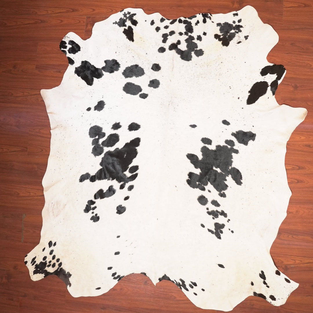 The Nguni Guy Nguni cowhide African decor Authentic cowhide Home decor Interior design Unique pattern Hand-selected Premium quality Natural beauty Exotic rug Genuine hide Statement piece Contemporary style Ethically sourced Sustainable decor Versatile accent Luxury rug Designer piece Modern aesthetic High-end craftsmanship Timeless elegance Designer home accents
