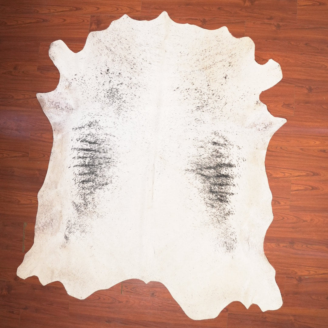 The Nguni Guy Nguni cowhide African decor Authentic cowhide Home decor Interior design Unique pattern Hand-selected Premium quality Natural beauty Exotic rug Genuine hide Statement piece Contemporary style Ethically sourced Sustainable decor Versatile accent Luxury rug Designer piece Modern aesthetic High-end craftsmanship Timeless elegance Designer home accents

