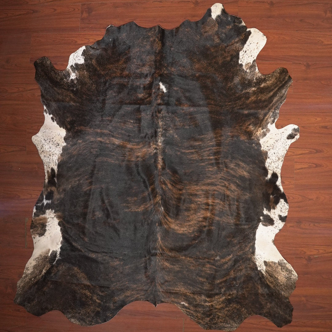 The Nguni Guy Nguni cowhide African decor Authentic cowhide Home decor Interior design Unique pattern Hand-selected Premium quality Natural beauty Exotic rug Genuine hide Statement piece Contemporary style Ethically sourced Sustainable decor Versatile accent Luxury rug Designer piece Modern aesthetic High-end craftsmanship Timeless elegance Designer home accents
