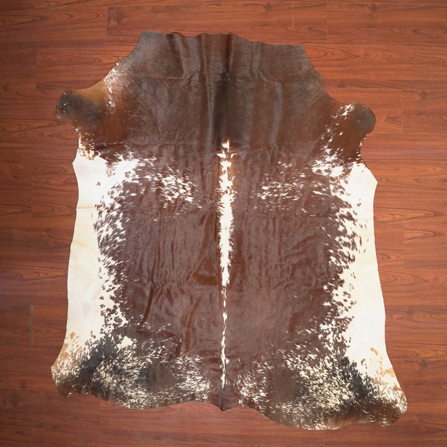 The Nguni Guy Nguni cowhide African decor Authentic cowhide Home decor Interior design Unique pattern Hand-selected Premium quality Natural beauty Exotic rug Genuine hide Statement piece Contemporary style Ethically sourced Sustainable decor Versatile accent Luxury rug Designer piece Modern aesthetic High-end craftsmanship Timeless elegance Designer home accents
