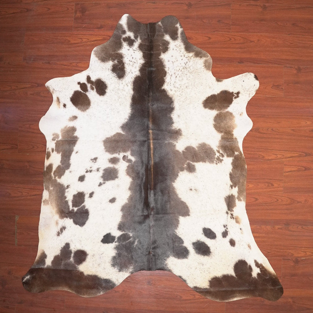 The Nguni Guy Nguni cowhide African decor Authentic cowhide Home decor Interior design Unique pattern Hand-selected Premium quality Natural beauty Exotic rug Genuine hide Statement piece Contemporary style Ethically sourced Sustainable decor Versatile accent Luxury rug Designer piece Modern aesthetic High-end craftsmanship Timeless elegance Designer home accents

