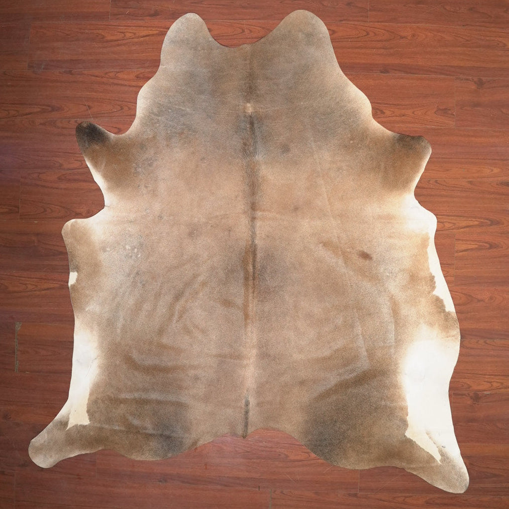 The Nguni Guy Nguni cowhide African decor Authentic cowhide Home decor Interior design Unique pattern Hand-selected Premium quality Natural beauty Exotic rug Genuine hide Statement piece Contemporary style Ethically sourced Sustainable decor Versatile accent Luxury rug Designer piece Modern aesthetic High-end craftsmanship Timeless elegance Designer home accents
